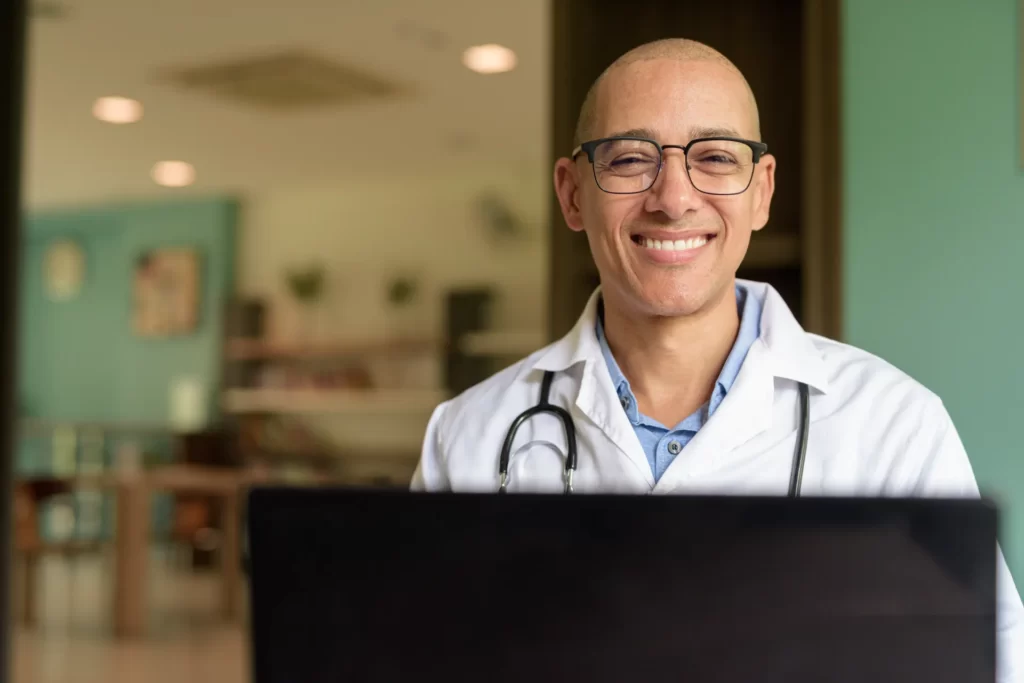 doctor sitting indoors in clinic or hospital area utc